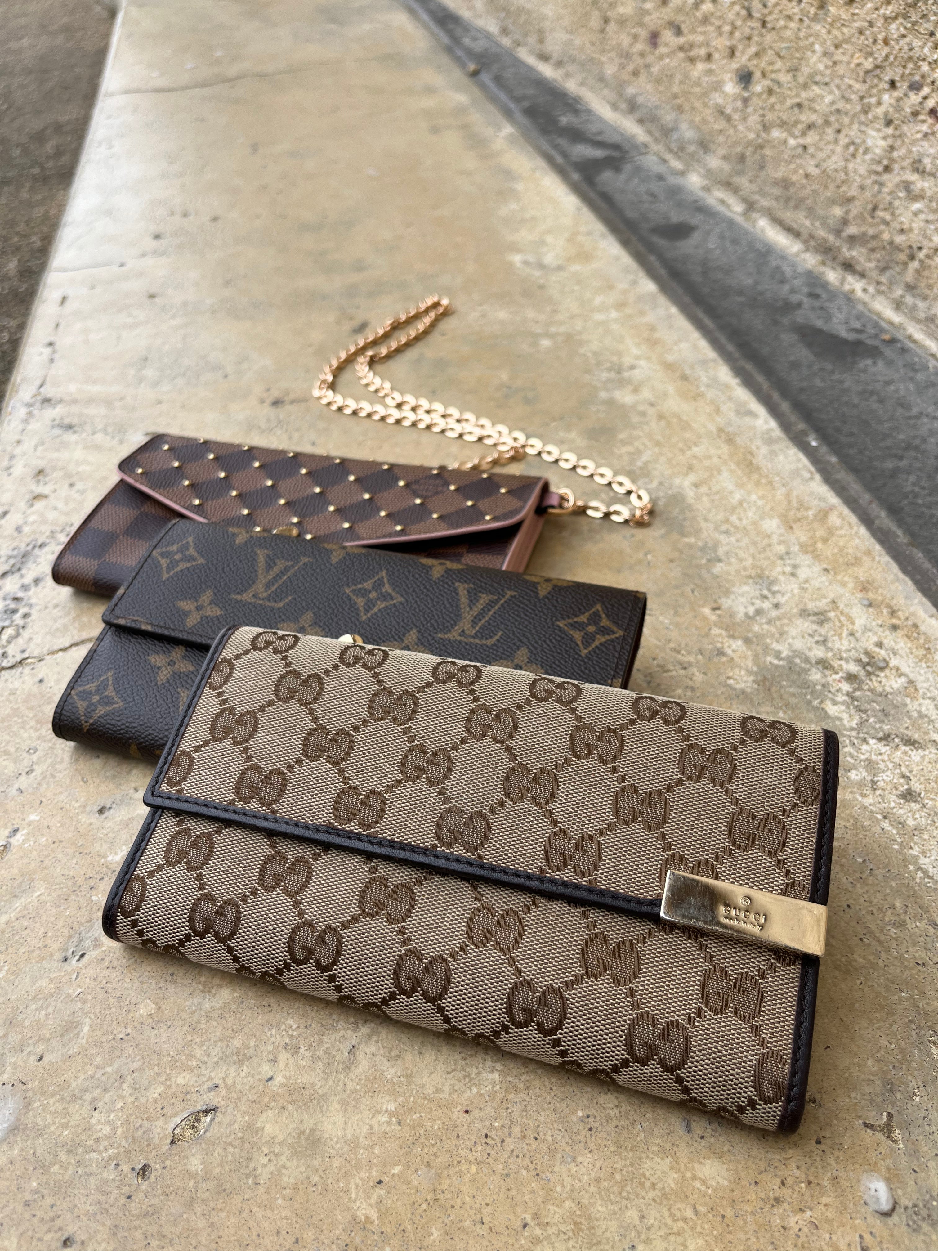 GUCCI BI-FOLD PORTEMONNEE
