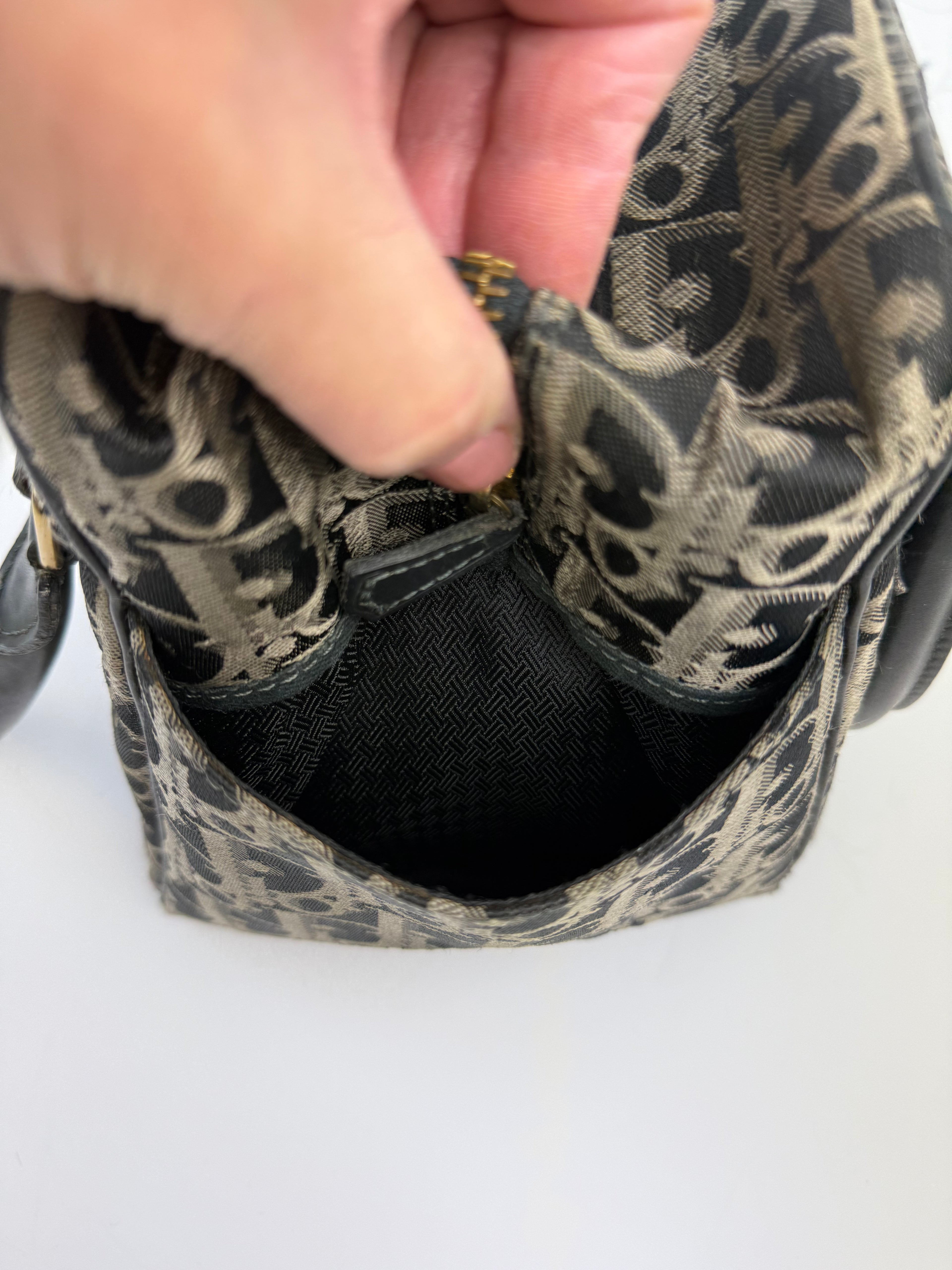 CHRISTIAN DIOR TROTTER