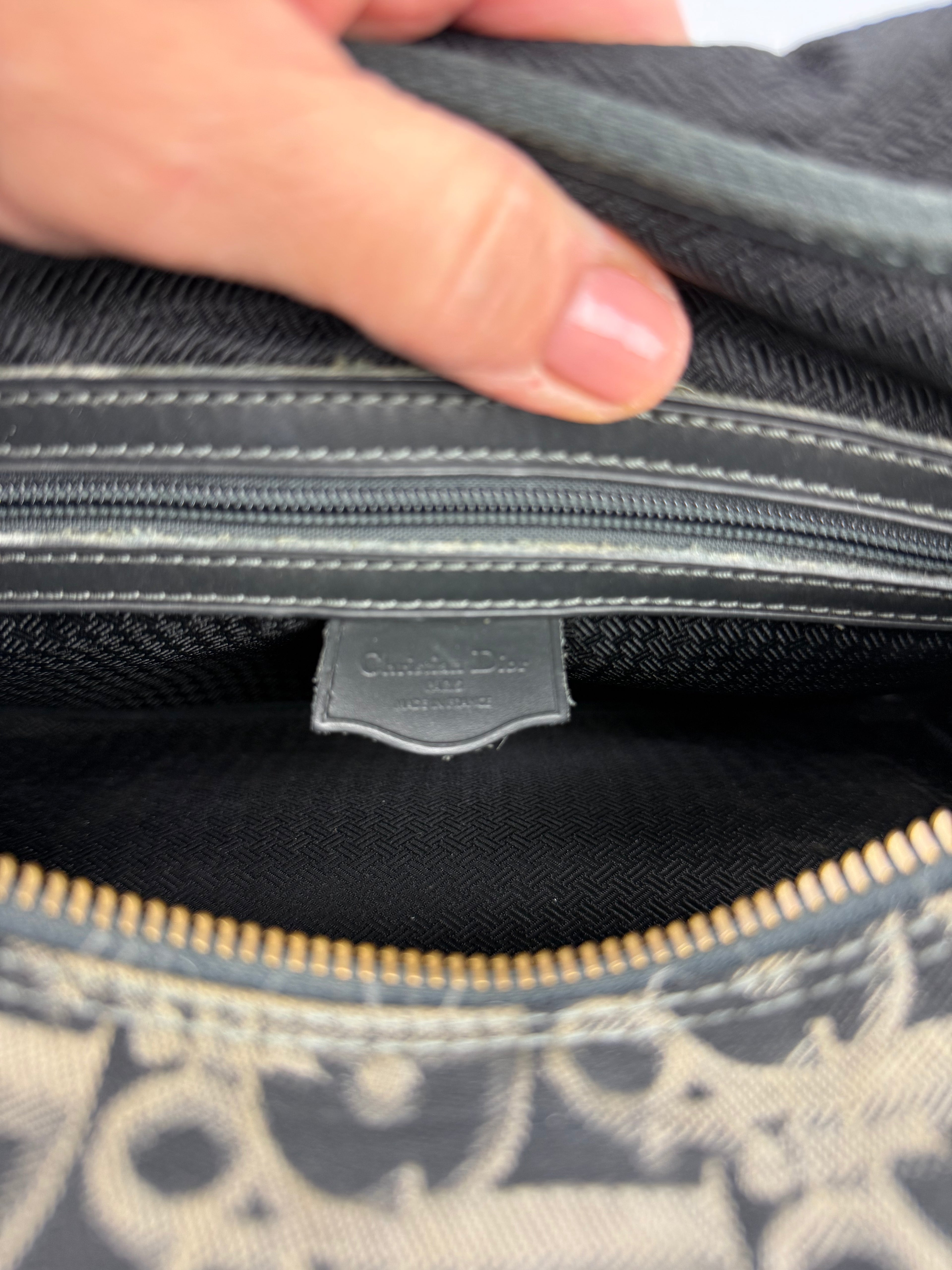 CHRISTIAN DIOR TROTTER